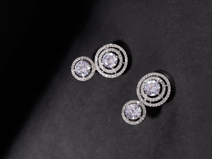 Silver-Toned Rhodium-Plated AD-Studded Handcrafted Circular Drop Earrings by Priyaasi